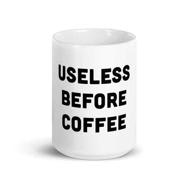 Useless Before Coffee White glossy mug